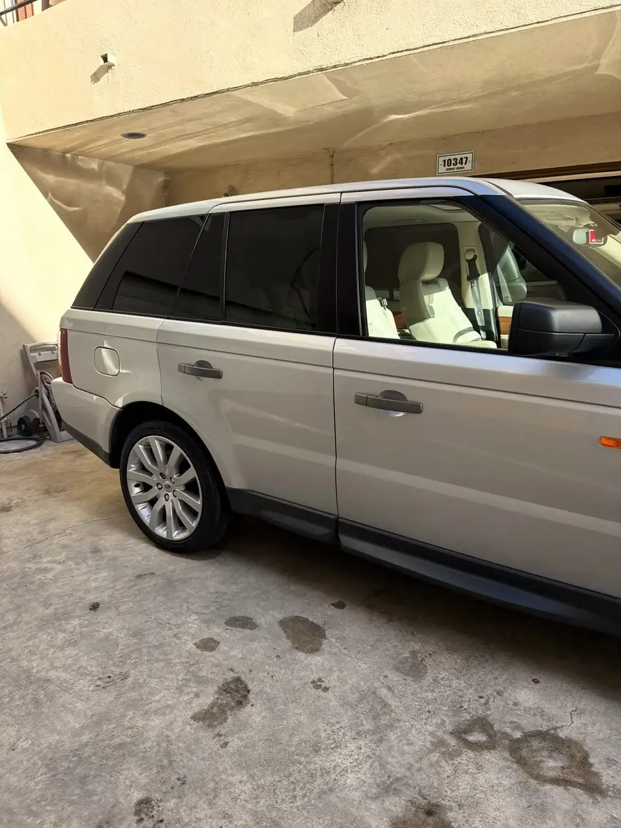 Range Rover Sport with the door open showing the cleaned interior